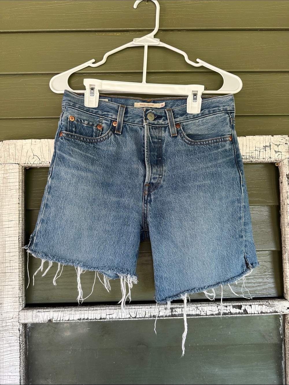 Levi's Distressed Light Blue Denim Cutoff Shorts